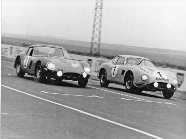 Claude in Aston Matrin DB4 Zagato (1) just beats the Ferrari 250 GTO of Sylvain Garant at Reims during a race on the Route du Nord event in 1964