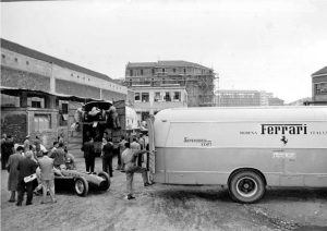 At the Lancia factory in Turin, the D50 grand prix cars are pushed out and loaded on to the Ferrari transporters. (Photo Graham Gauld archive)