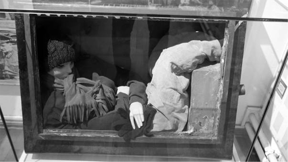 The petrol tank from the Alvis in the Museum using a dummy to show how Friedl curled up with her legs on the 18 litre tank, (Graham Gauld)