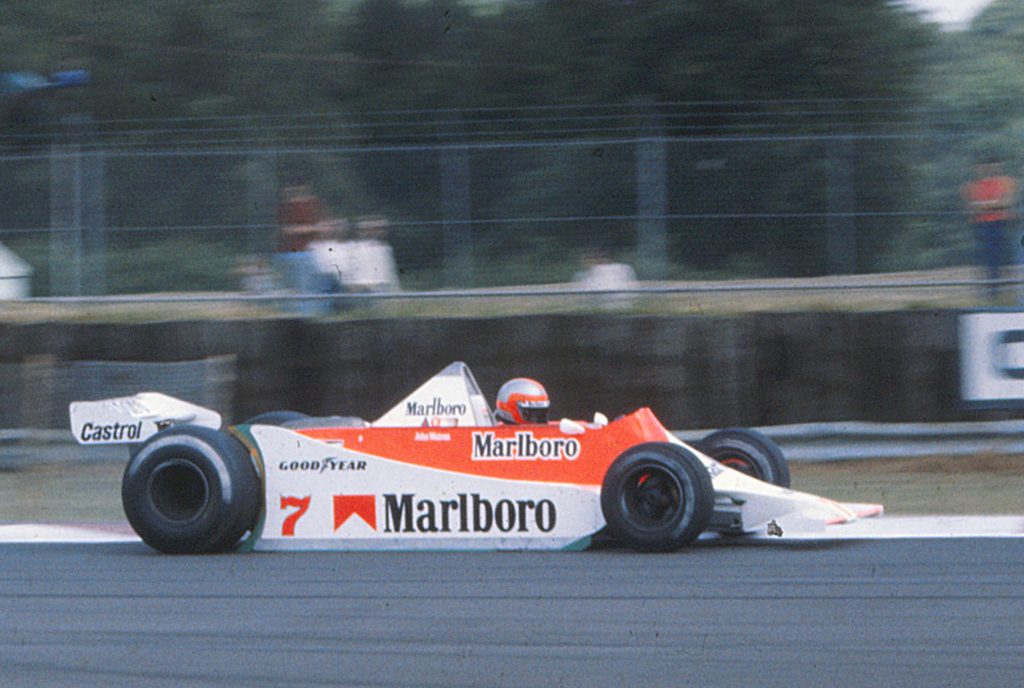 John at the wheel of a McLaren, a familiar sight