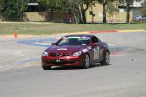 Vern Schuppan on the original Adelaide circuit in 2004 driving the latest Mercedes SLK sports car