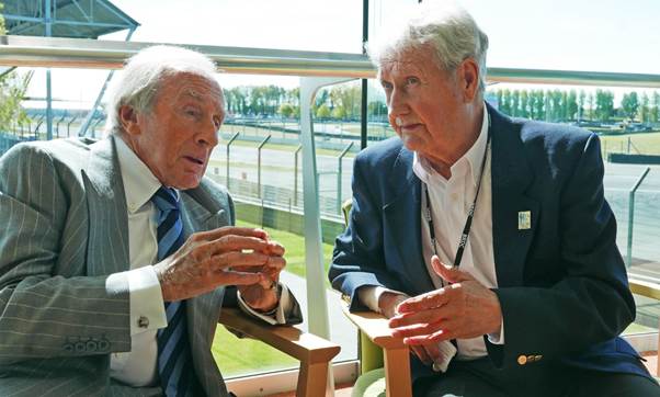 Sir Jackie Stewart chats with “Beaky” Simms who was Clark’s mechanic at Hockenheim on that fateful day. (Photo Gauld)